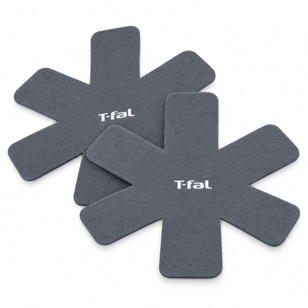 Two T-fal felt cookware protectors for separating stacked pots and pans in hotel, Airbnb and furnished rental kitchens.