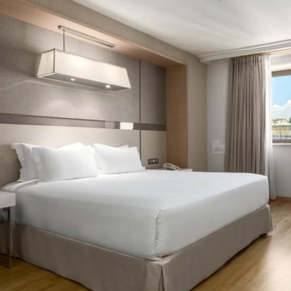 premium fitted bed sheets for Airbnb, motels, and inns, designed for comfort and durability, available in bulk bedding supply
