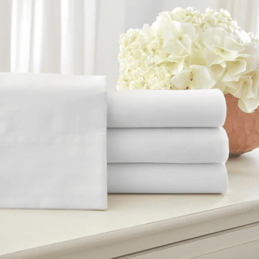 premium fitted sheets for Airbnb, motels, and inns, designed for comfort and durability, available in bulk bedding supply