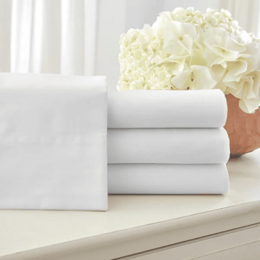 premium fitted sheets for Airbnb, motels, and inns, designed for comfort and durability, available in bulk bedding supply