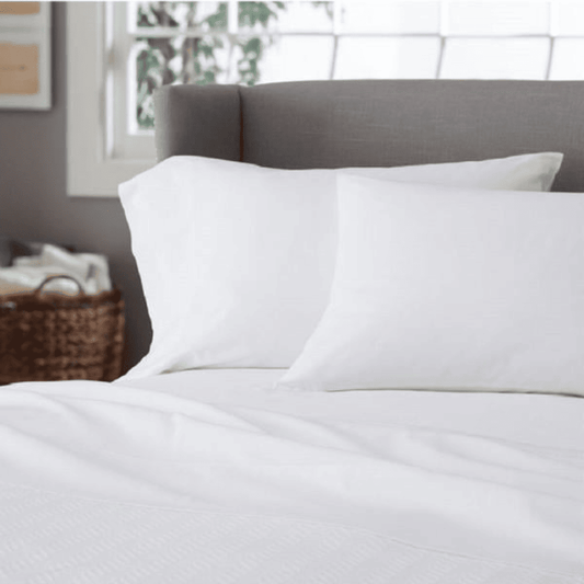 Premium cotton-polyester blend pillowcases for hotels, Airbnb, and motels, ideal for comfort and bulk bedding supply