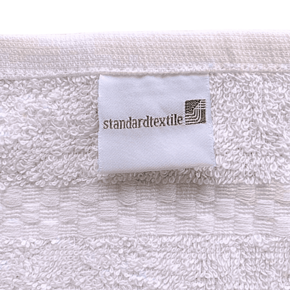 Commercial-grade washcloths with a smooth, plush texture built to withstand frequent laundering in hospitality settings