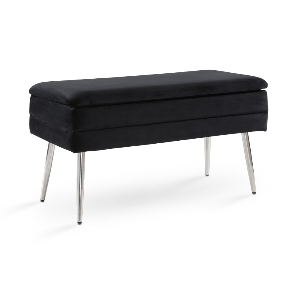 Black velvet enya storage bench with chrome legs and lift-top design, ideal for hotel rooms, entryways, or bedroom seating with modern appeal.