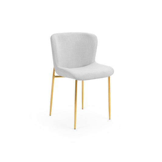 Modern accent chair with white upholstered seat and gold metal legs, perfect for hotel rooms, dining areas, or stylish contemporary interiors.
