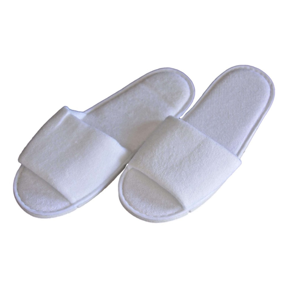 Disposable open-toe slippers for hotel and spa bulk orders, designed for guest use and comfort