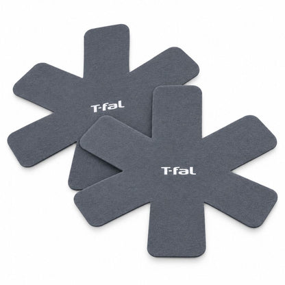 Two T-fal felt cookware protectors for separating stacked pots and pans in hotel, Airbnb and furnished rental kitchens.