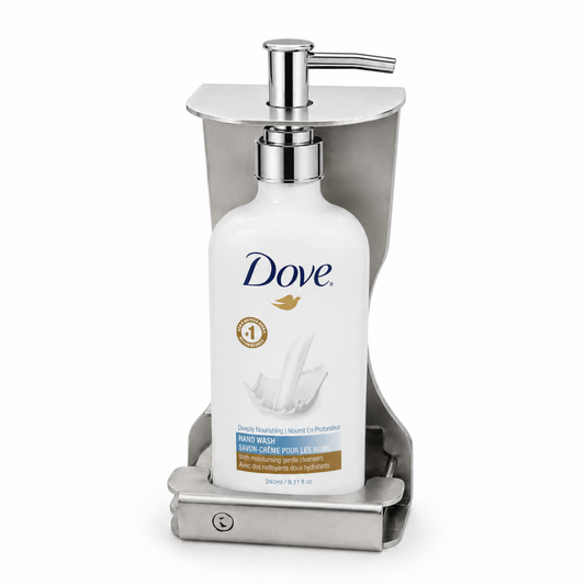 Dove body lotion in a locking stainless steel single dispenser bracket for hotels, resorts, spas, and commercial guest bathrooms.