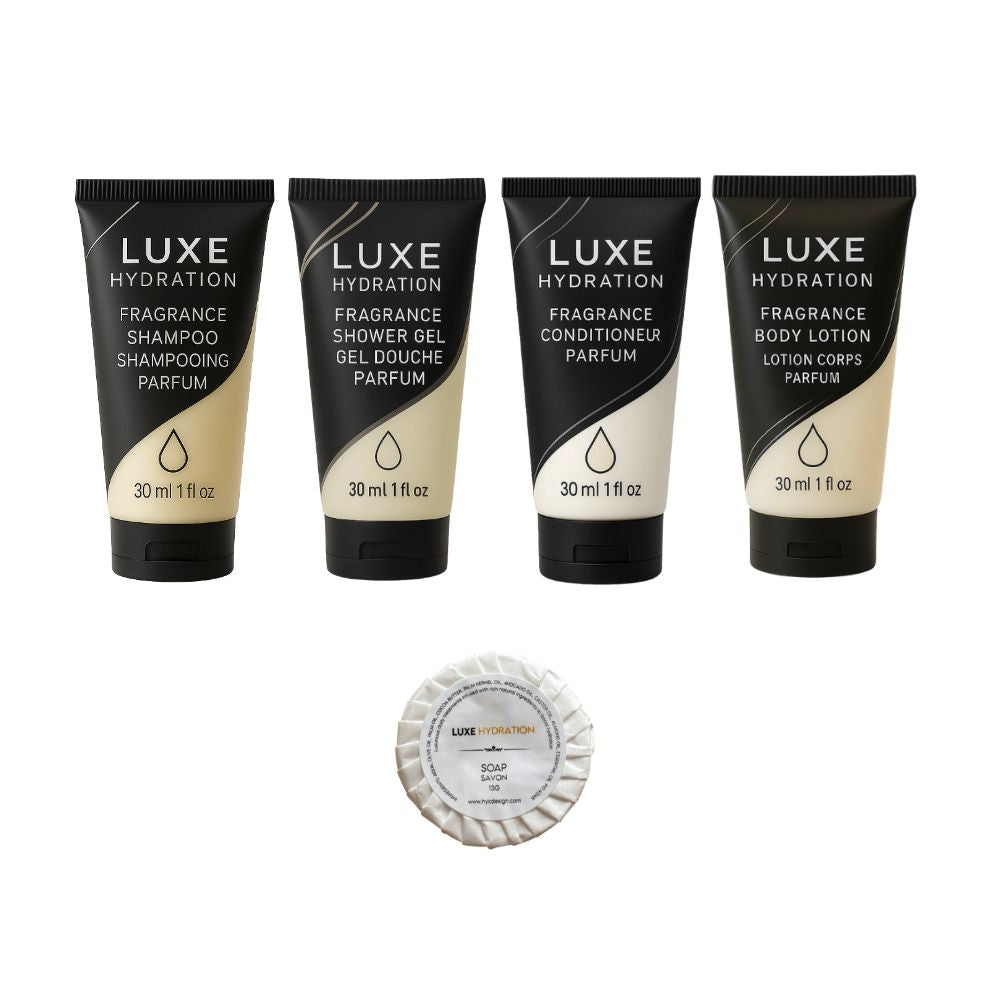 Luxe Hydration 5-piece fragrance hotel amenity set with shampoo, shower gel, conditioner, body lotion and 13g soap for hospitality.