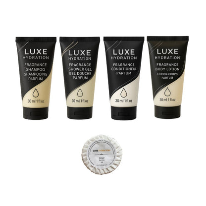 Luxe Hydration 5-piece fragrance hotel amenity set with shampoo, shower gel, conditioner, body lotion and 13g soap for hospitality.