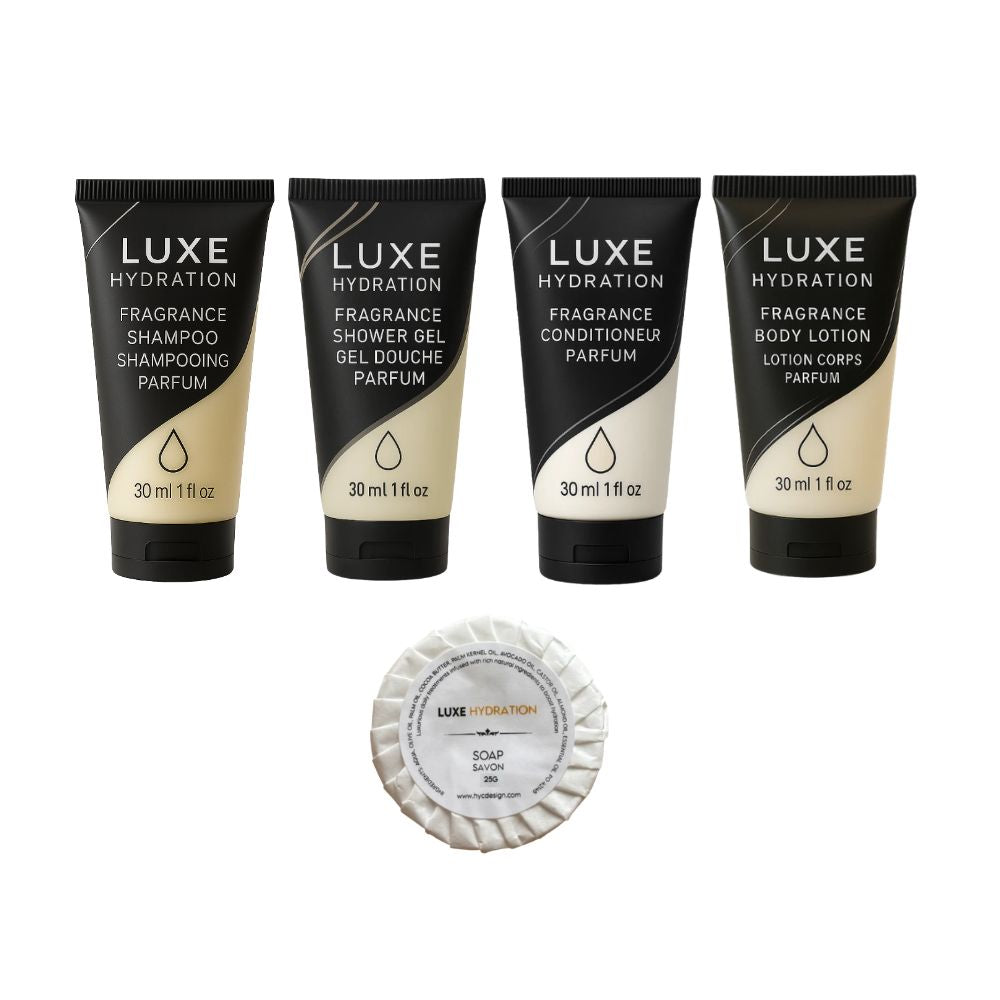 Luxe Hydration 5-piece fragrance hotel amenity set with shampoo, shower gel, conditioner, body lotion and 25g soap for hospitality.