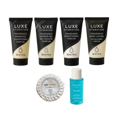 Six-piece Luxe Hydration hospitality toiletry kit with four bath products, 25 g soap and mint mouthwash for hotels and resorts.