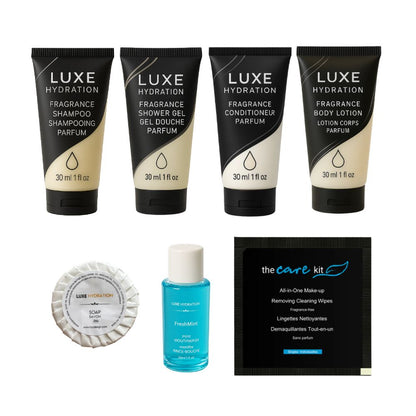 Luxe Hydration hotel toiletry set with four bath amenities, 25 g guest soap, FreshMint mouthwash and cleansing wipe for hospitality use.