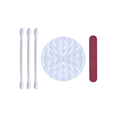 Travel-size vanity kit with cotton pads, swabs, and nail file, hygienically packed for boutique hotels and luxury stay