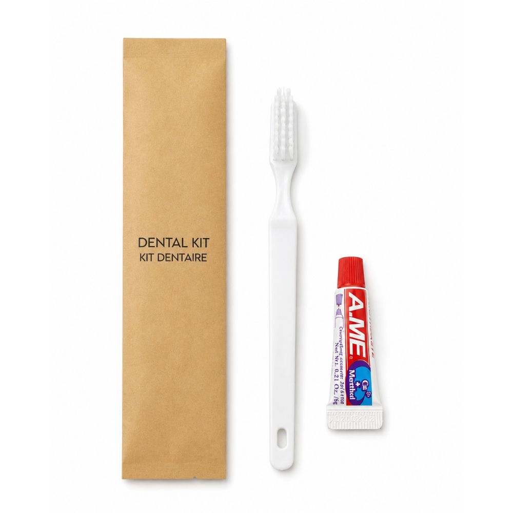 Kraft dental kit with white toothbrush and travel-size toothpaste, ideal for hotels, motels, resorts, spas and guest amenity programs.