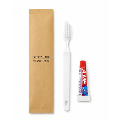 Kraft dental kit with white toothbrush and travel-size toothpaste, ideal for hotels, motels, resorts, spas and guest amenity programs.