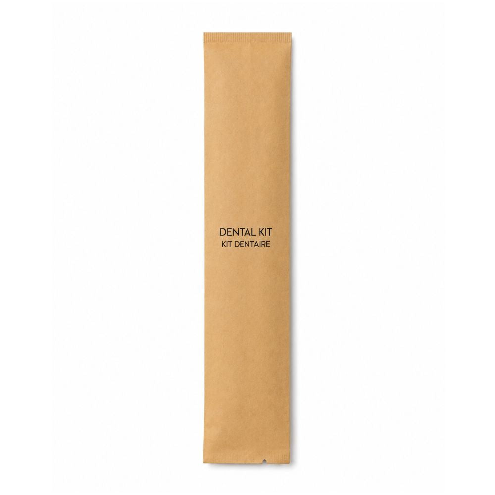 Individually wrapped dental kit in a kraft sleeve labelled Dental Kit and Kit Dentaire for hotels, resorts and hospitality supply.