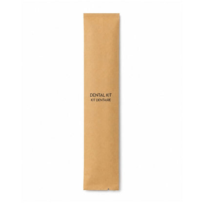 Individually wrapped dental kit in a kraft sleeve labelled Dental Kit and Kit Dentaire for hotels, resorts and hospitality supply.