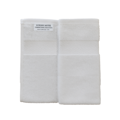 Premium 100% Turkish cotton hand towel, hotel-quality, soft, absorbent folded to show all the detail. Perfect for hospitality use