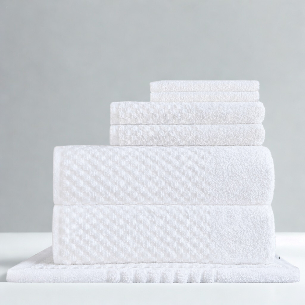 Hotel bath towel offering, cotton linens for guest bathrooms and bulk hospitality supply