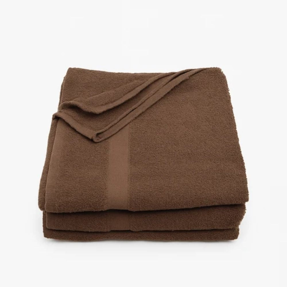 Folded brown commercial bath towels with durable terry texture for hotels, motels, resorts, spas and hospitality properties.