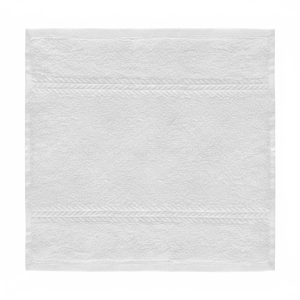 Cotton washcloths with a herringbone weave designed for bulk hospitality use, offering durability, softness, and refined presentation