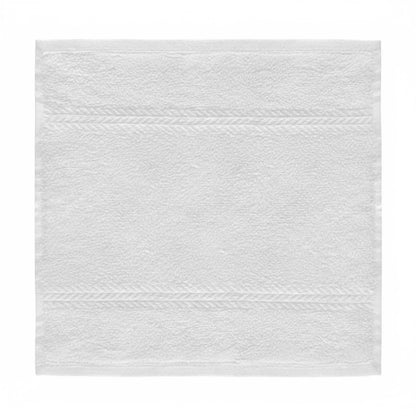 Cotton washcloths with a herringbone weave designed for bulk hospitality use, offering durability, softness, and refined presentation