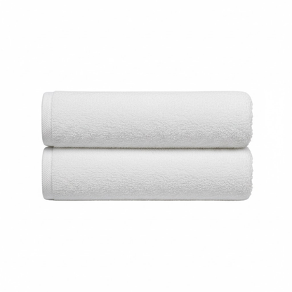 Oversized cotton bath sheets designed for hotel use, offering consistent softness, durability, and full guest coverage