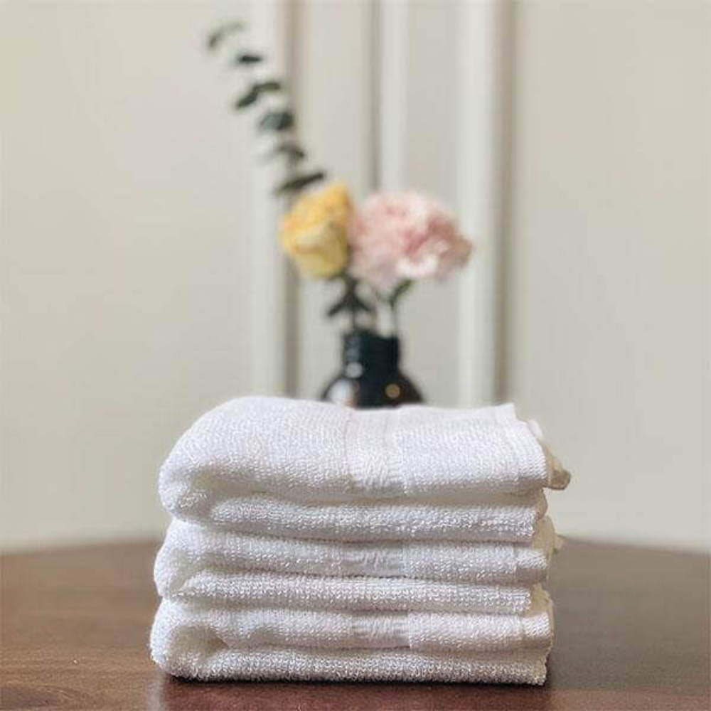 Premium Hand Towel folded on table.