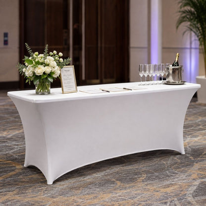 White fitted spandex rectangular table cover styled for a professional hospitality event, ideal for registration, catering, conferences and trade shows.