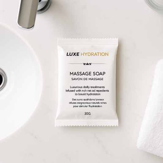 Luxe Massage Soap 30g on bathroom counter, individually wrapped and ideal for guest stays or spa-inspired routines.
