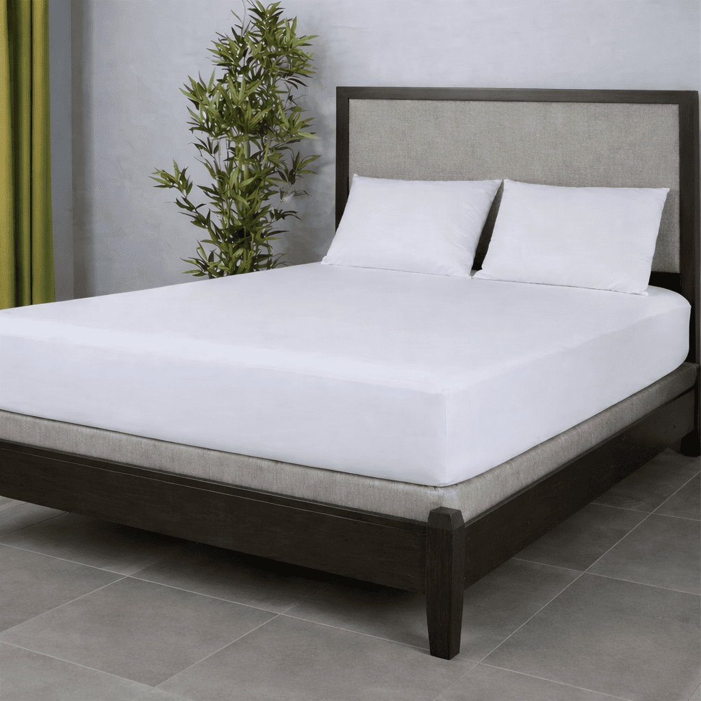 Modern bed with smooth white mattress encasement on dark wood frame, minimal headboard, gray tile flooring, ideal for hotel and Airbnb use.