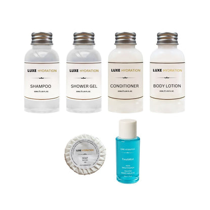 Luxe Hydration hospitality toiletry set with four bath products, 13g soap and FreshMint mouthwash for guest rooms and vacation rentals.