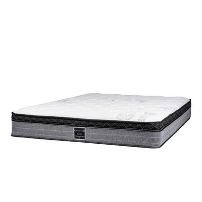 Classic quilted hotel mattress with white top and grey sides. Ideal for enhancing guest comfort and hospitality sleep experience at wholesale pricing.