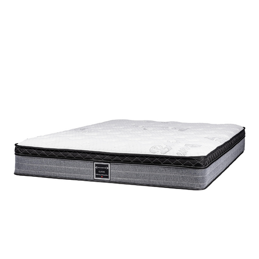 Classic quilted hotel mattress with white top and grey sides. Ideal for enhancing guest comfort and hospitality sleep experience at wholesale pricing.