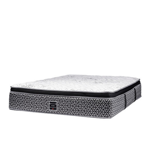 Mattress featuring a unique pebble-patterned base and plush white top, crafted for premium hospitality, available at Canadian Hotel Supplies.