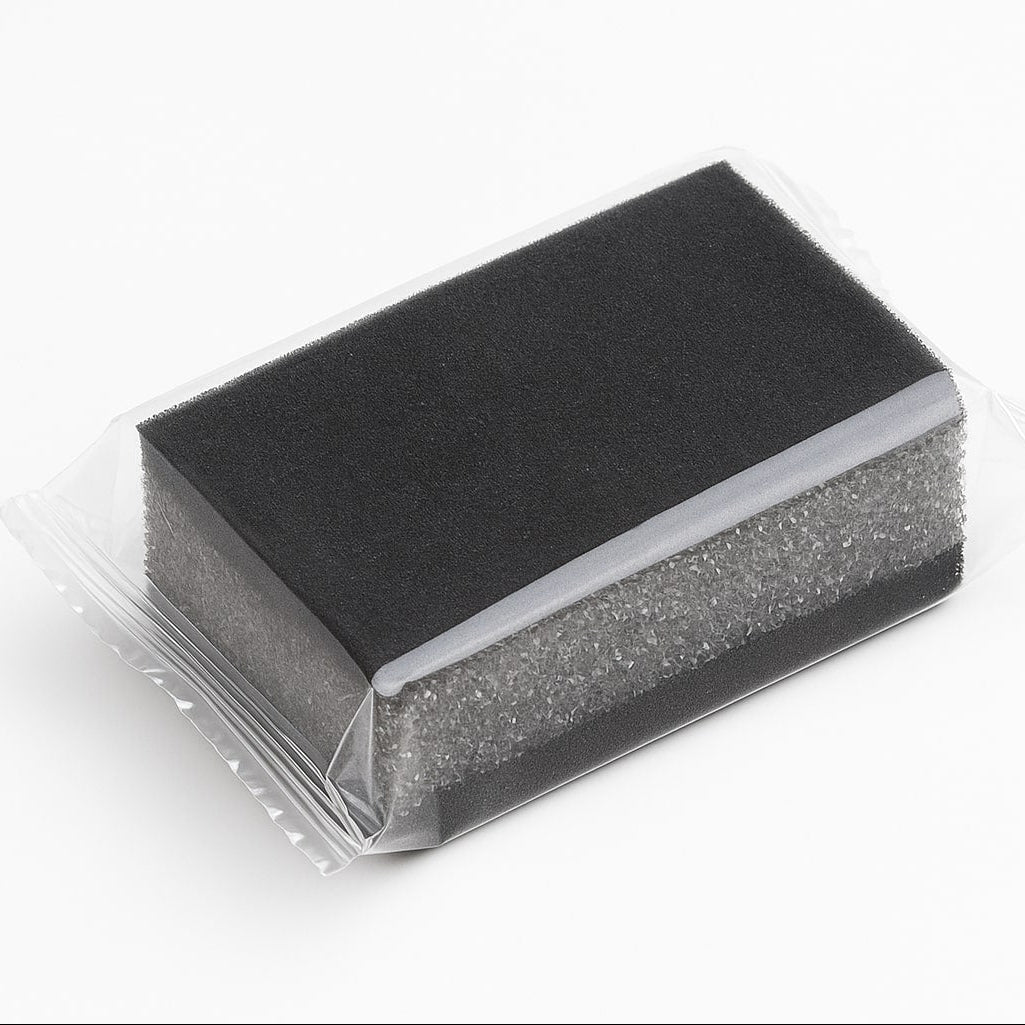 Individually wrapped hotel shoe shine sponge for guest room amenities and housekeeping use, provides quick leather polish