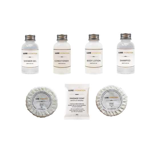 Full 700-piece amenity set with 100 each of shampoo, conditioner, lotion, soap, and shower gel, ideal for hotels and rentals