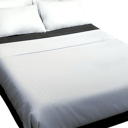Decorative top sheet with waffle design for upscale hotel and guest room bedding