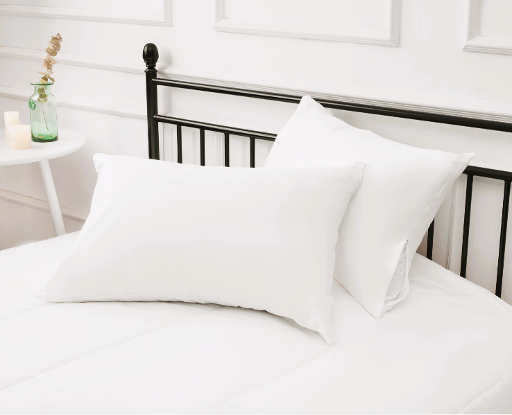 Ultra‑soft white Microtech pillow protector, breathable and durable—ideal for hotel beds, Airbnb, and guest-room bedding